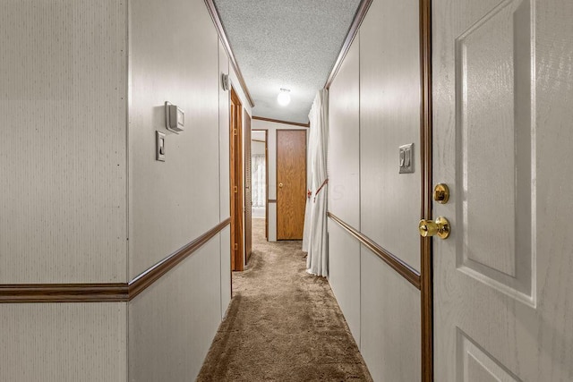 8764 National Rd SW Unit 118, Etna, OH 43062 - corridor with light carpet and a textured ceiling