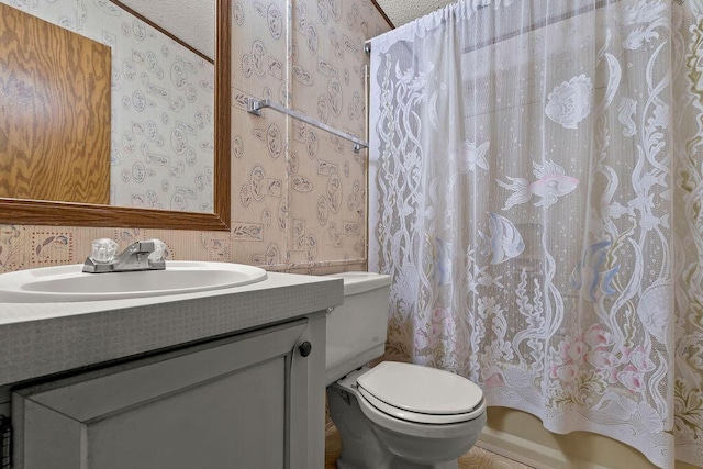 8764 National Rd SW Unit 118, Etna, OH 43062 - bathroom with wallpapered walls, vanity, toilet, and shower / bath combination with curtain