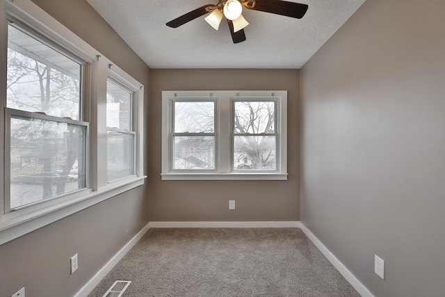 212-214 S Eureka Ave, Columbus, OH 43204 - carpeted spare room featuring a ceiling fan and baseboards