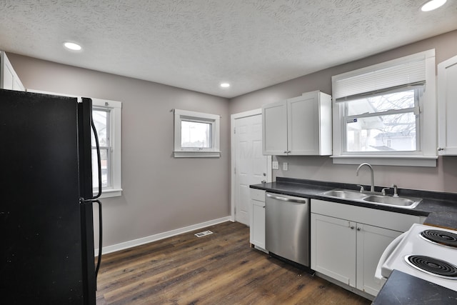 212-214 S Eureka Ave, Columbus, OH 43204 - kitchen with freestanding refrigerator, dishwasher, a sink, white electric range, and recessed lighting