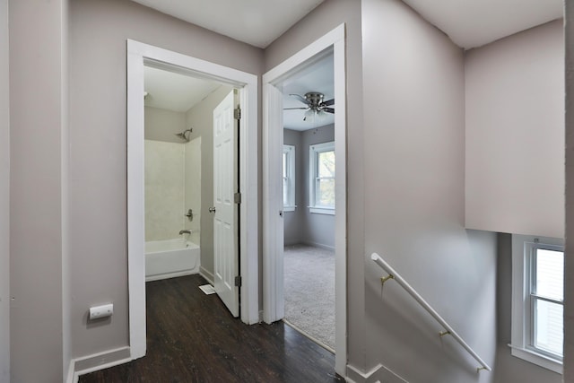 212-214 S Eureka Ave, Columbus, OH 43204 - hallway featuring an upstairs landing, dark wood finished floors, and baseboards