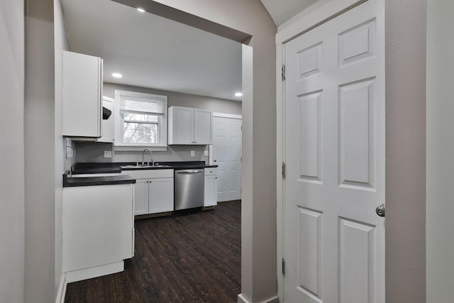 212-214 S Eureka Ave, Columbus, OH 43204 - kitchen featuring dishwasher, dark wood-style flooring, a sink, dark countertops, and white cabinets