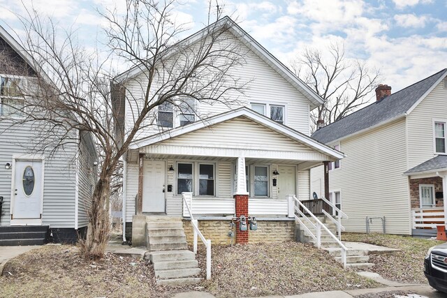 212-214 S Eureka Ave, Columbus, OH 43204 - view of front facade featuring a porch and entry steps