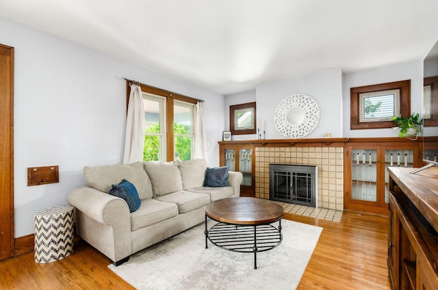 138 E Kelso Rd, Columbus, OH 43202 - living area with light wood-style floors and a fireplace