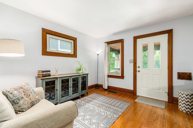 138 E Kelso Rd, Columbus, OH 43202 - foyer featuring baseboards and wood finished floors