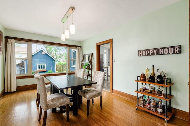 138 E Kelso Rd, Columbus, OH 43202 - dining area with baseboards and light wood-type flooring