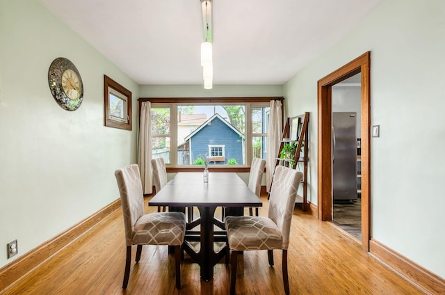 138 E Kelso Rd, Columbus, OH 43202 - dining space featuring light wood-style floors and baseboards
