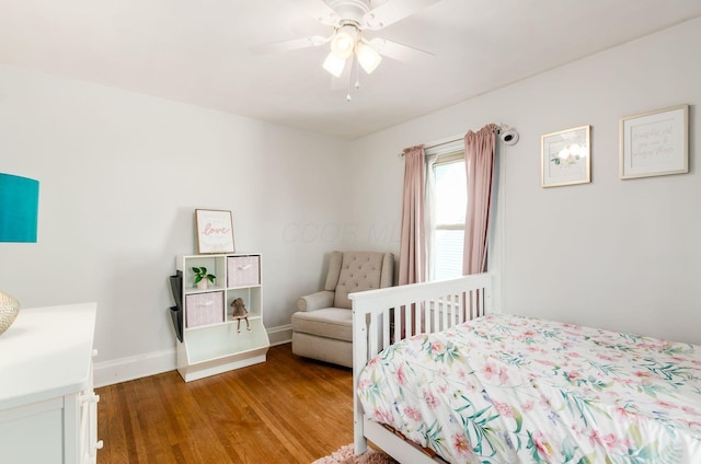138 E Kelso Rd, Columbus, OH 43202 - bedroom featuring light wood-style floors, baseboards, and ceiling fan