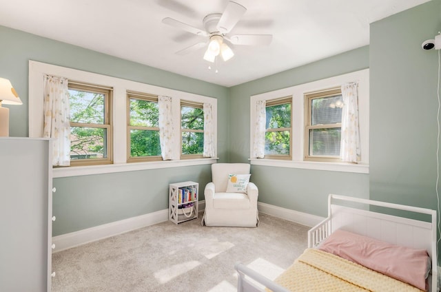 138 E Kelso Rd, Columbus, OH 43202 - carpeted bedroom featuring baseboards, multiple windows, and a ceiling fan