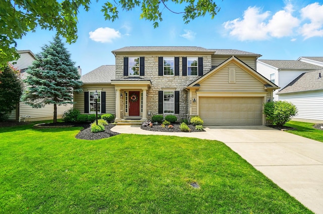 8073 Tree Lake Blvd, Powell, OH 43065 - view of front of house featuring stone siding, driveway, a front yard, and an attached garage