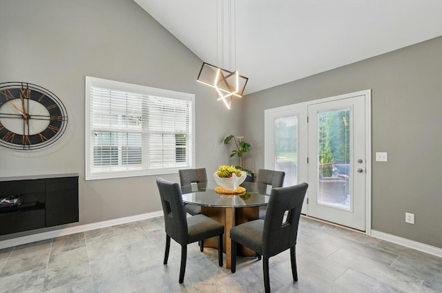 8073 Tree Lake Blvd, Powell, OH 43065 - dining space featuring plenty of natural light, high vaulted ceiling, and a chandelier