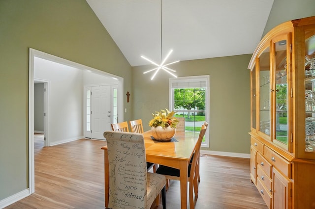 8073 Tree Lake Blvd, Powell, OH 43065 - dining area with vaulted ceiling and light wood finished floors