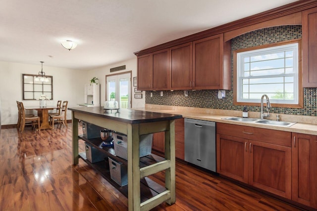 1875 Madden Higgins Rd, London, OH 43140 - kitchen with stainless steel dishwasher, a sink, dark wood-style floors, and decorative backsplash