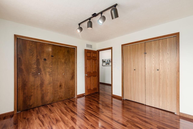 1875 Madden Higgins Rd, London, OH 43140 - unfurnished bedroom with wood finished floors and baseboards