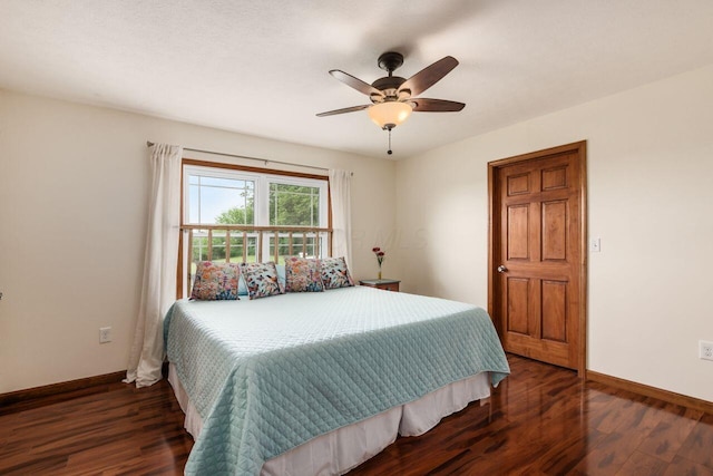 1875 Madden Higgins Rd, London, OH 43140 - bedroom featuring baseboards, wood finished floors, and a ceiling fan