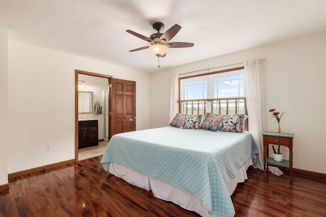1875 Madden Higgins Rd, London, OH 43140 - bedroom featuring baseboards, wood finished floors, ceiling fan, and connected bathroom