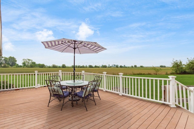 1875 Madden Higgins Rd, London, OH 43140 - wooden terrace with outdoor dining space, a view of countryside, and a lawn