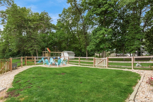 1875 Madden Higgins Rd, London, OH 43140 - view of yard with a playground and an outbuilding