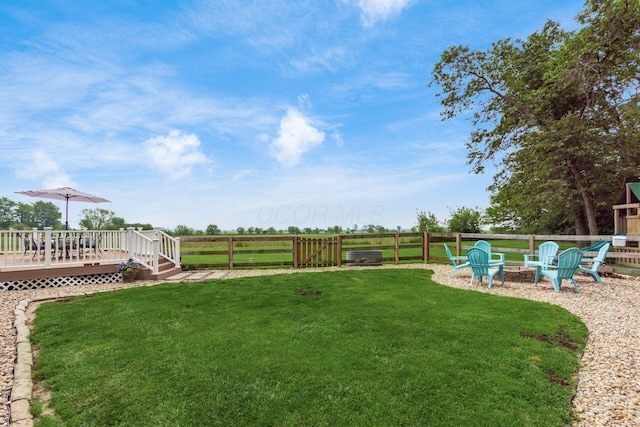 1875 Madden Higgins Rd, London, OH 43140 - view of yard featuring an outdoor fire pit and a wooden deck