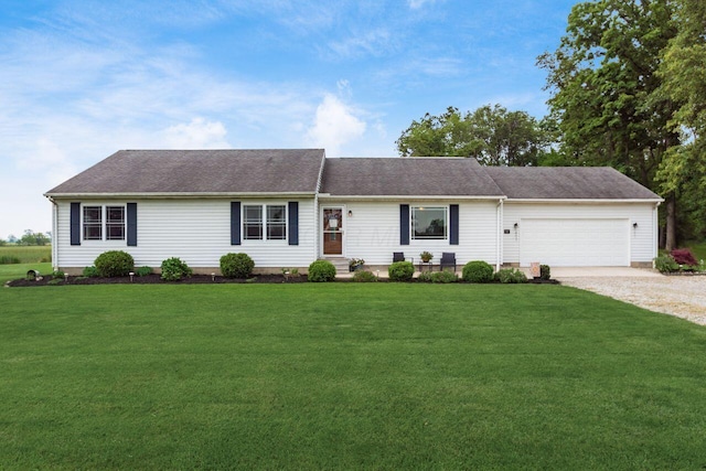 1875 Madden Higgins Rd, London, OH 43140 - single story home featuring dirt driveway, a front lawn, and a garage