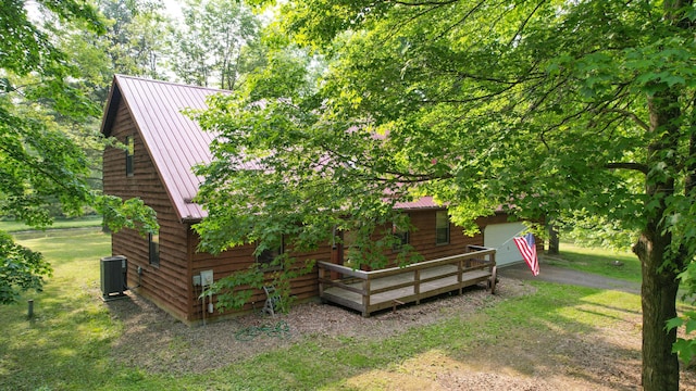 5467 Timpson Rd, Caledonia, OH 43314 - view of front of home featuring metal roof, cooling unit, and a front yard