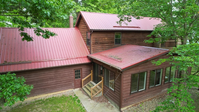 5467 Timpson Rd, Caledonia, OH 43314 - back of house featuring a chimney and metal roof