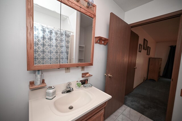 5467 Timpson Rd, Caledonia, OH 43314 - full bath with vanity and marble look tile flooring