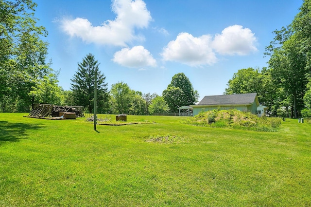 5350 Brook Rd NW, Lancaster, OH 43130 - view of grassy yard featuring a detached carport