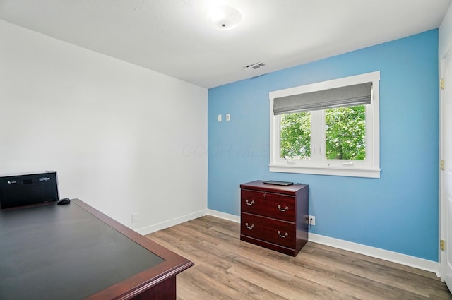 5350 Brook Rd NW, Lancaster, OH 43130 - unfurnished bedroom featuring baseboards and wood finished floors