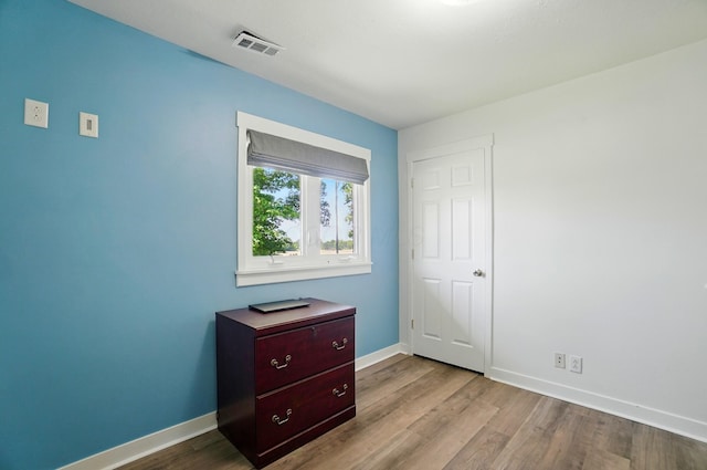 5350 Brook Rd NW, Lancaster, OH 43130 - unfurnished bedroom featuring baseboards and wood finished floors