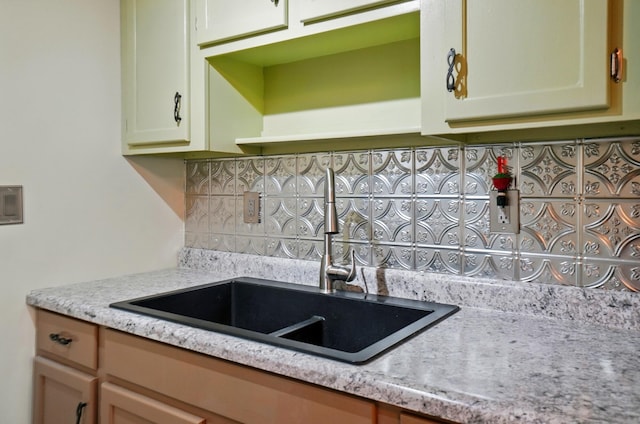 5350 Brook Rd NW, Lancaster, OH 43130 - kitchen featuring a sink, backsplash, light stone countertops, and open shelves