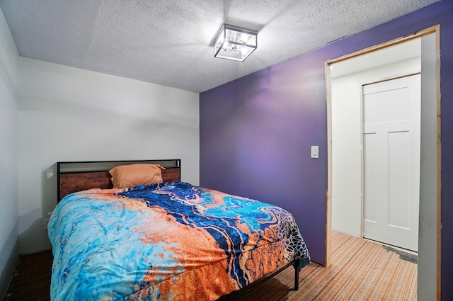 5350 Brook Rd NW, Lancaster, OH 43130 - bedroom with a textured ceiling and carpet floors