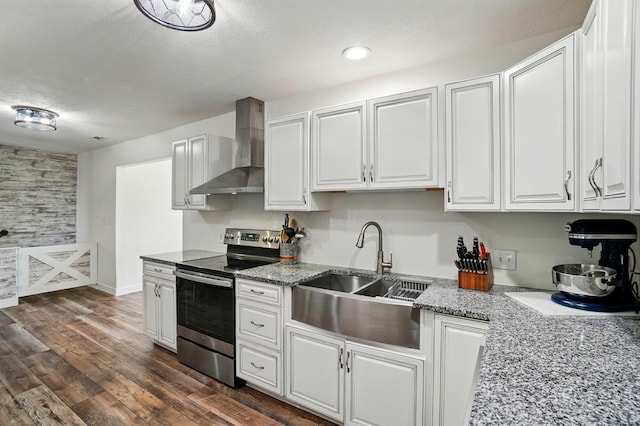 5350 Brook Rd NW, Lancaster, OH 43130 - kitchen featuring stainless steel electric range oven, wall chimney exhaust hood, a sink, white cabinetry, and dark wood-type flooring