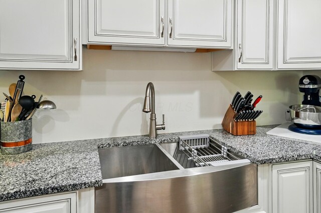 5350 Brook Rd NW, Lancaster, OH 43130 - kitchen view of a sink and white cabinetry