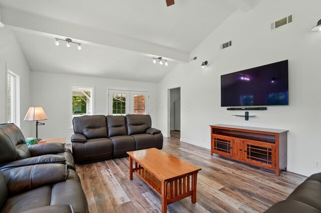 5350 Brook Rd NW, Lancaster, OH 43130 - living area with track lighting, wood finished floors, and baseboards