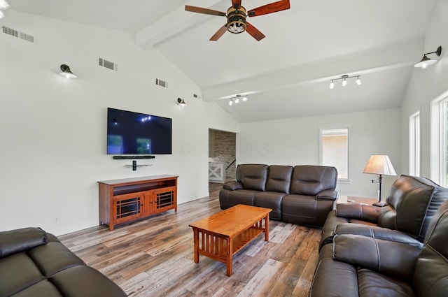 5350 Brook Rd NW, Lancaster, OH 43130 - living room with ceiling fan, wood finished floors, rail lighting, and baseboards