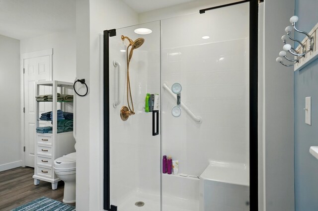 5350 Brook Rd NW, Lancaster, OH 43130 - full bath featuring toilet, a shower stall, and wood finished floors