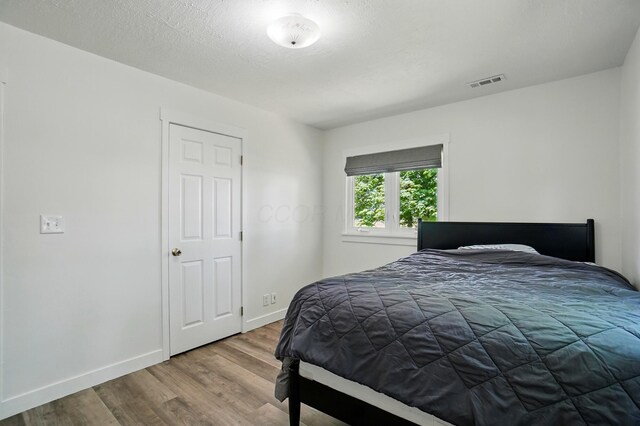 5350 Brook Rd NW, Lancaster, OH 43130 - bedroom featuring wood finished floors and baseboards