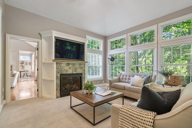 8467 Tartan Fields Dr, Dublin, OH 43017 - carpeted living room featuring a glass covered fireplace