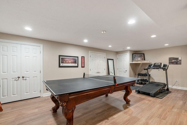 8467 Tartan Fields Dr, Dublin, OH 43017 - recreation room with light wood-style floors, recessed lighting, and baseboards