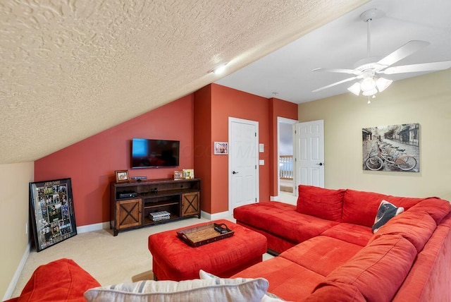 8467 Tartan Fields Dr, Dublin, OH 43017 - carpeted living area with a ceiling fan, a textured ceiling, vaulted ceiling, and baseboards