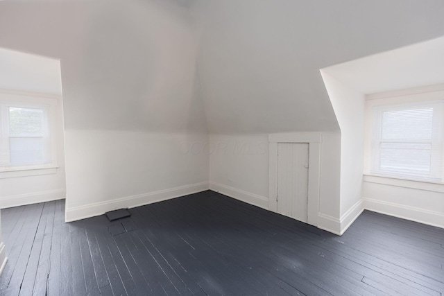 1210-1212 Dennison Ave, Columbus, OH 43201 - bonus room with baseboards, dark wood-style flooring, and vaulted ceiling