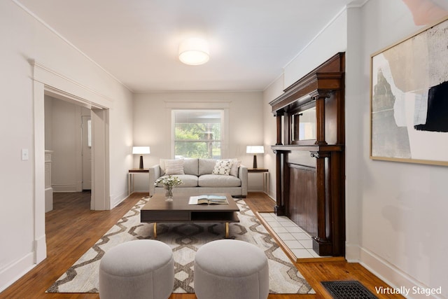 1210-1212 Dennison Ave, Columbus, OH 43201 - living area with light wood-style floors and baseboards