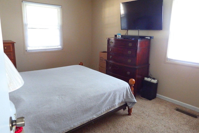 5082 Sutherland Dr, Columbus, OH 43207 - carpeted bedroom featuring baseboards
