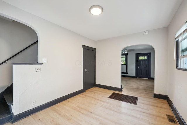 147 Schultz Ave, Columbus, OH 43222 - foyer entrance featuring arched walkways and light wood-type flooring