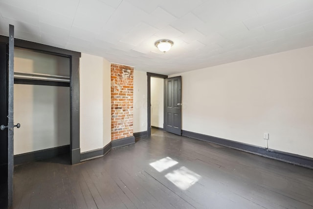 147 Schultz Ave, Columbus, OH 43222 - unfurnished bedroom with wood-type flooring and a closet