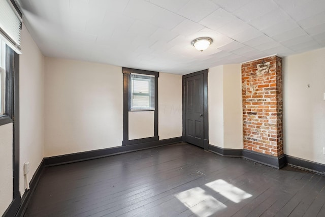 147 Schultz Ave, Columbus, OH 43222 - empty room featuring dark wood-style floors and baseboards