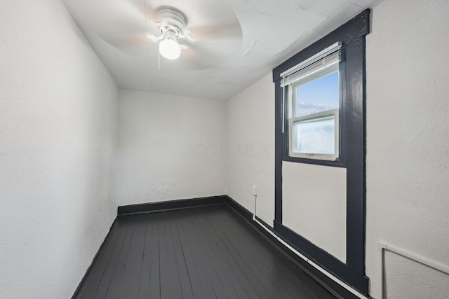 147 Schultz Ave, Columbus, OH 43222 - empty room with ceiling fan, dark wood finished floors, and a textured wall