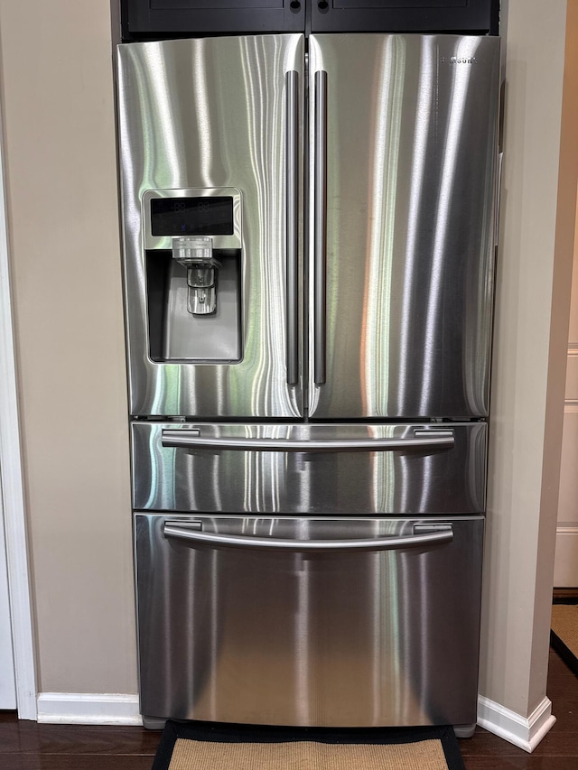 150 Shawnee Dr, Pickerington, OH 43147 - detailed view of stainless steel fridge with ice dispenser and dark wood-type flooring