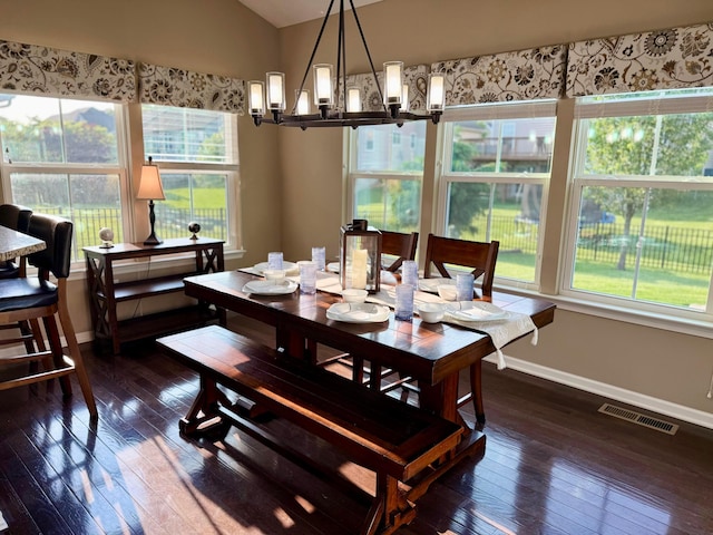 150 Shawnee Dr, Pickerington, OH 43147 - dining room featuring a chandelier, plenty of natural light, baseboards, dark wood-style flooring, and vaulted ceiling